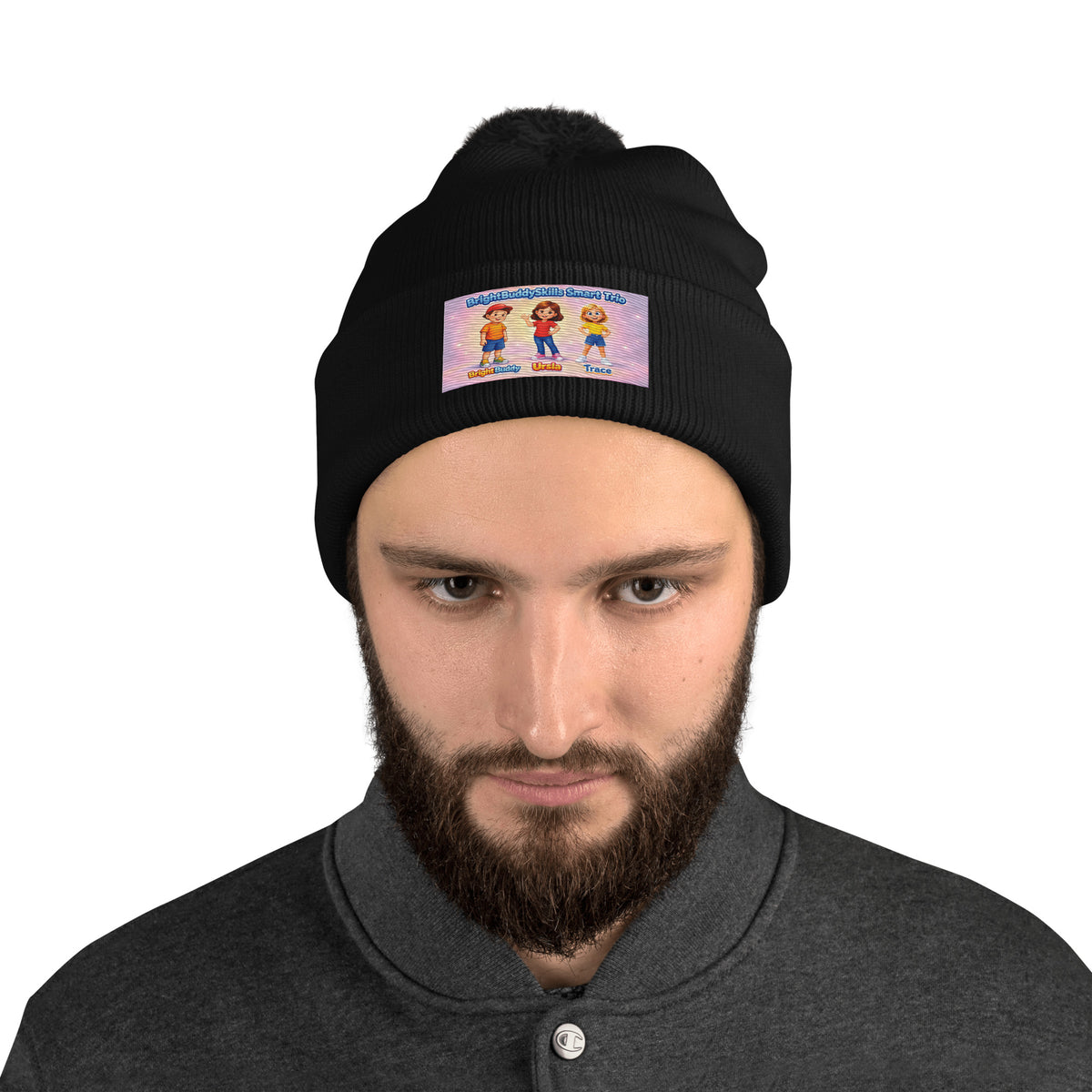 BrightBuddySkills Smart Trio pom-pom knit beanie, black, front view — product mockup